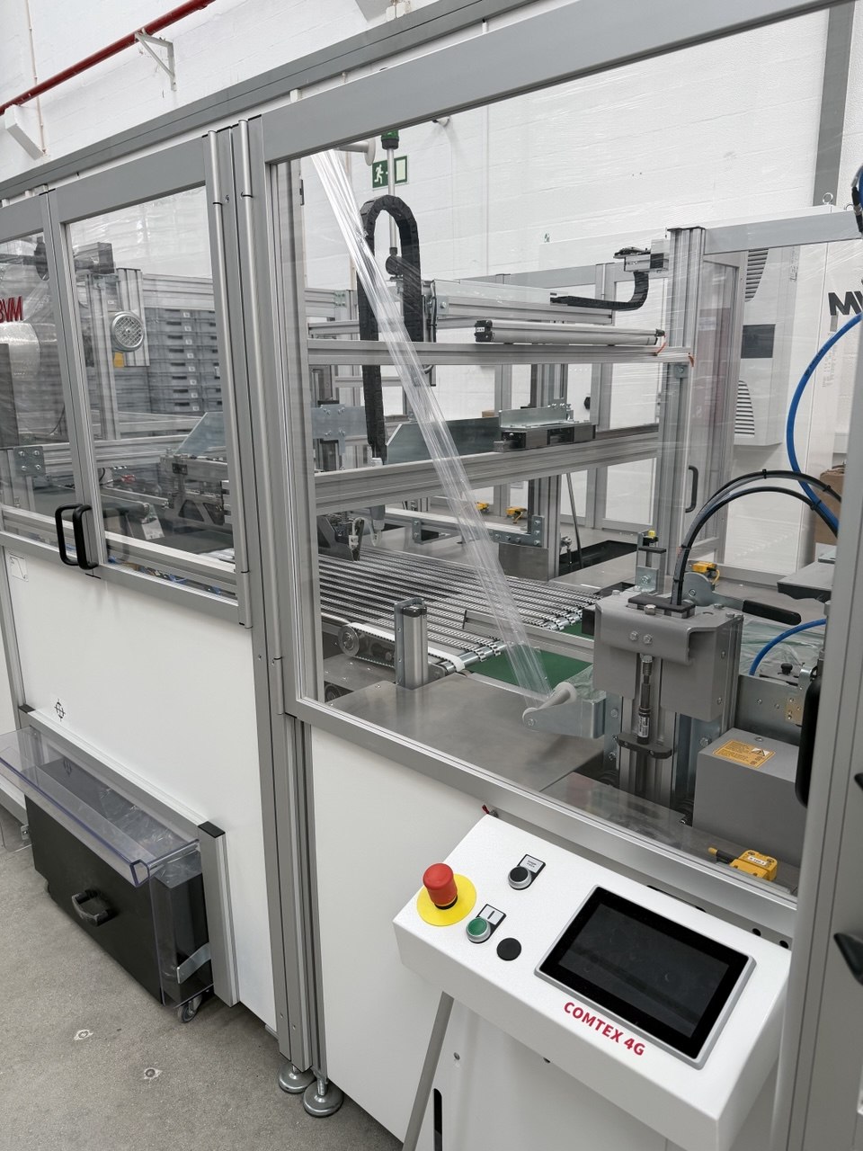 Linha de embalagem automática COMTEX no armazém AZORA